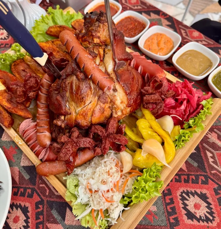Branded  Pork knuckle board at Tbilisuri Ezo Georgian restaurant in Tbilisi }}