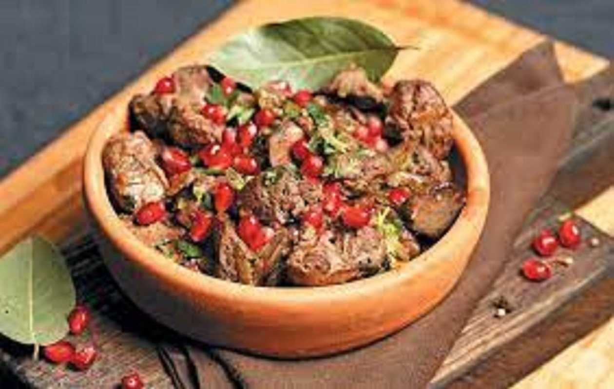 Chicken liver on a plate at Tbilisuri Ezo Georgian restaurant in Tbilisi }}
