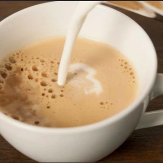Instant coffee with milk - Georgian dish at Tbilisuri Ezo restaurant in Tbilisi }}